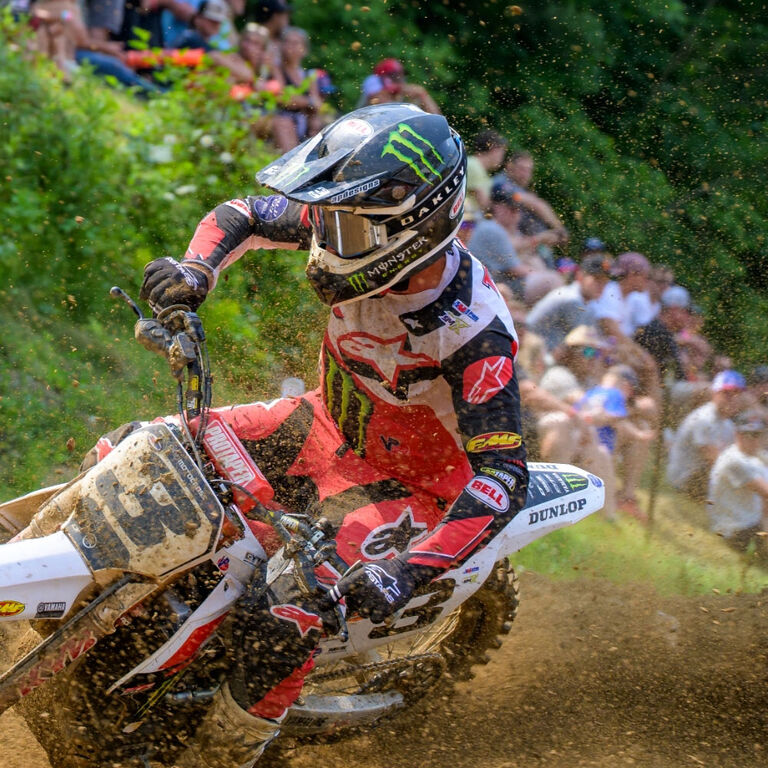 MX Rider with a crowd in the background