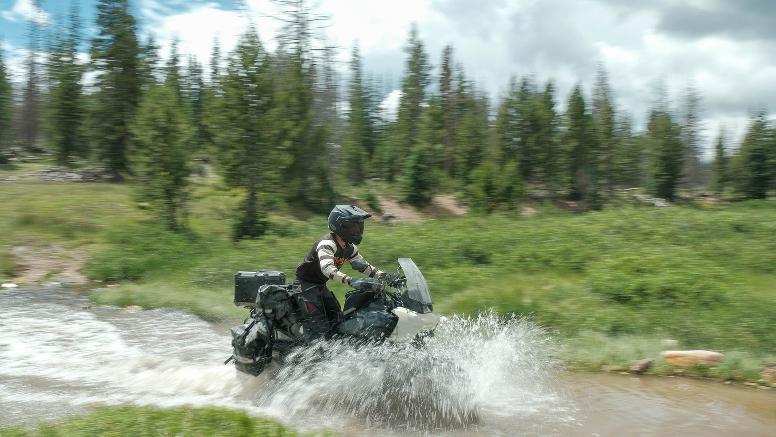 Jake Hindes riding Pan America through river