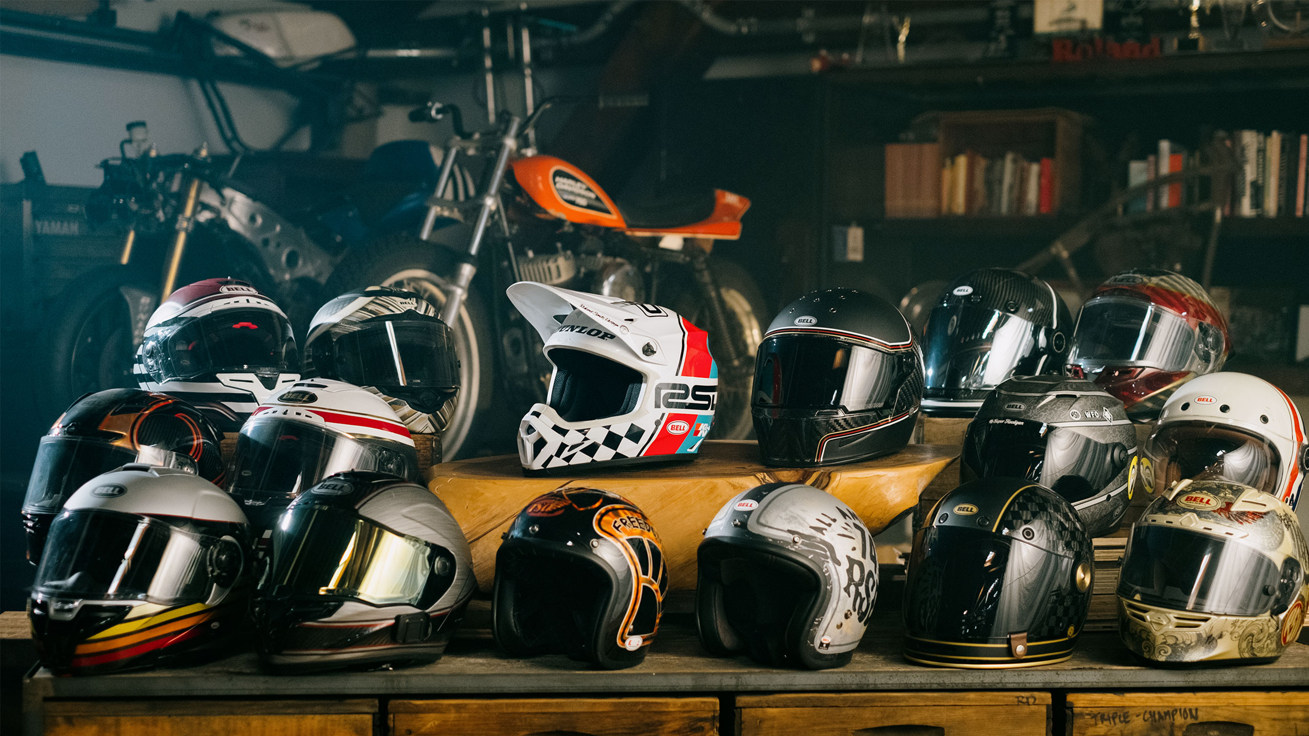 The MX-9 Mips RSD Rally helmet in the middle of a group of other Bell + RSD collab helmets